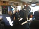 (L-R) Keith Aurich, KD7TOF; Jim Bassett, W1RO, and Jack Cook, N8RRL in the Clark County IT Department  communications van. [Jim Davis, KF7GCT, photo]